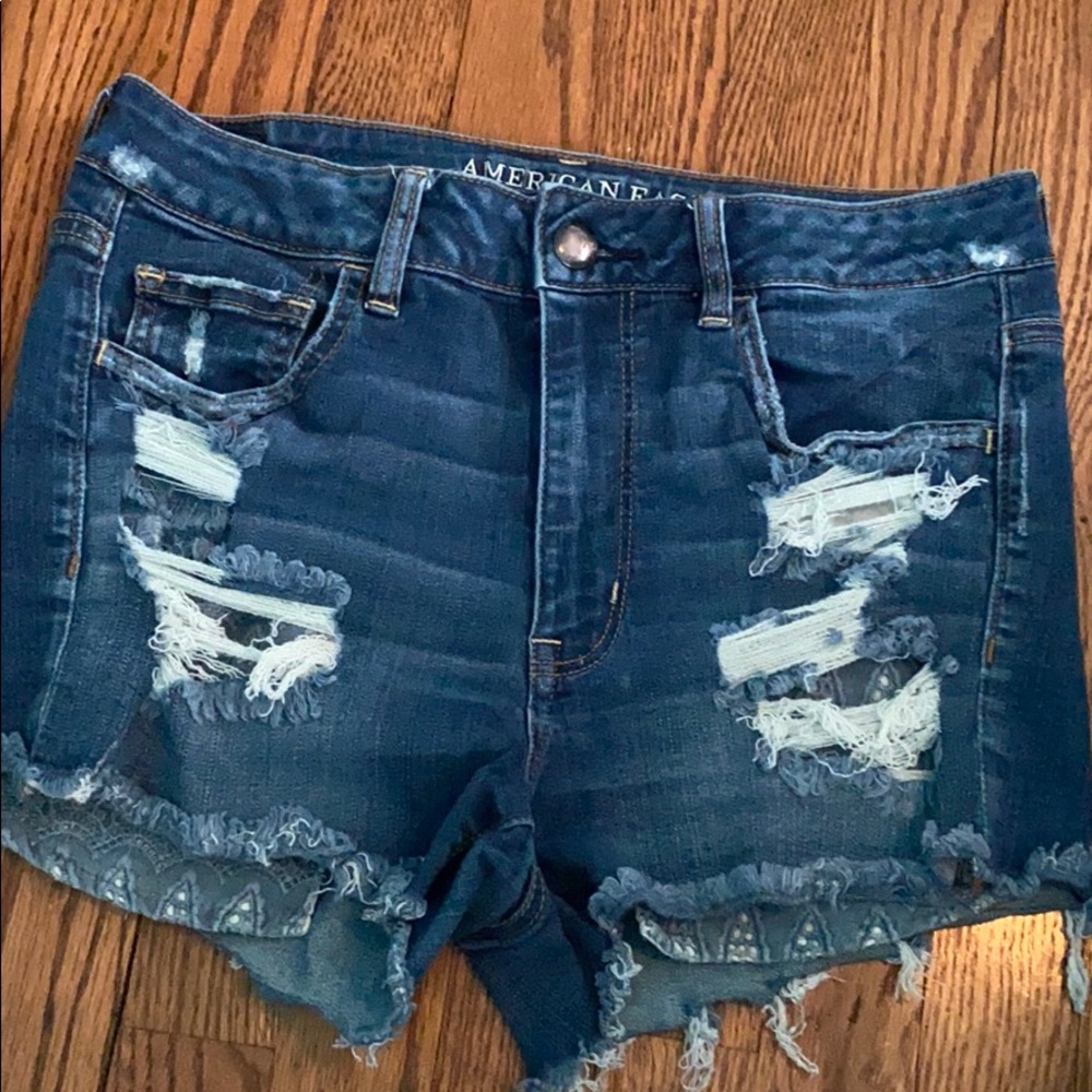 Blue ripped jean shorts